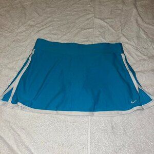 blue and white nike tennis challengers